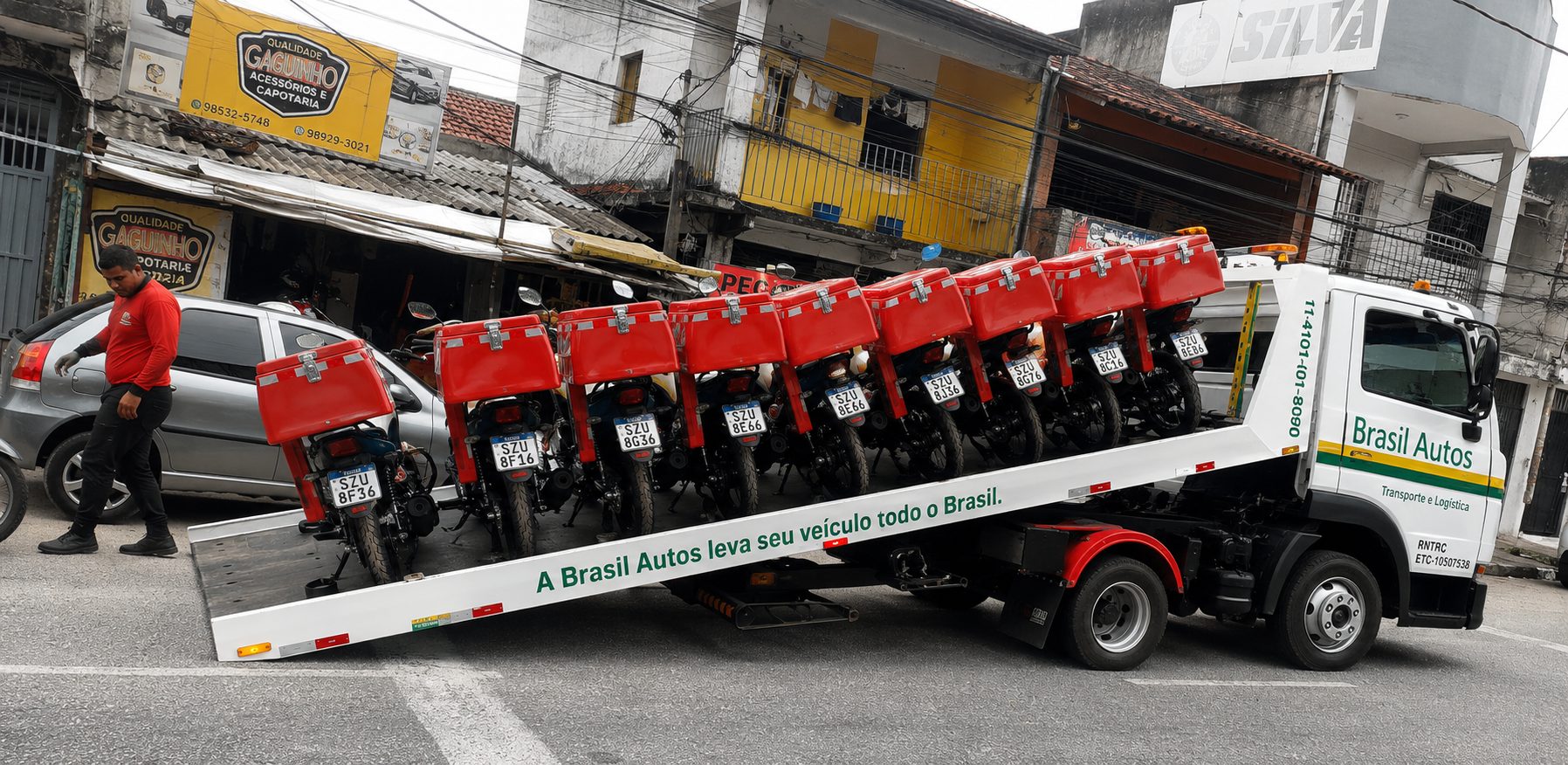Motos carregadas na plataforma da Brasil Autos com conferência fotográfica